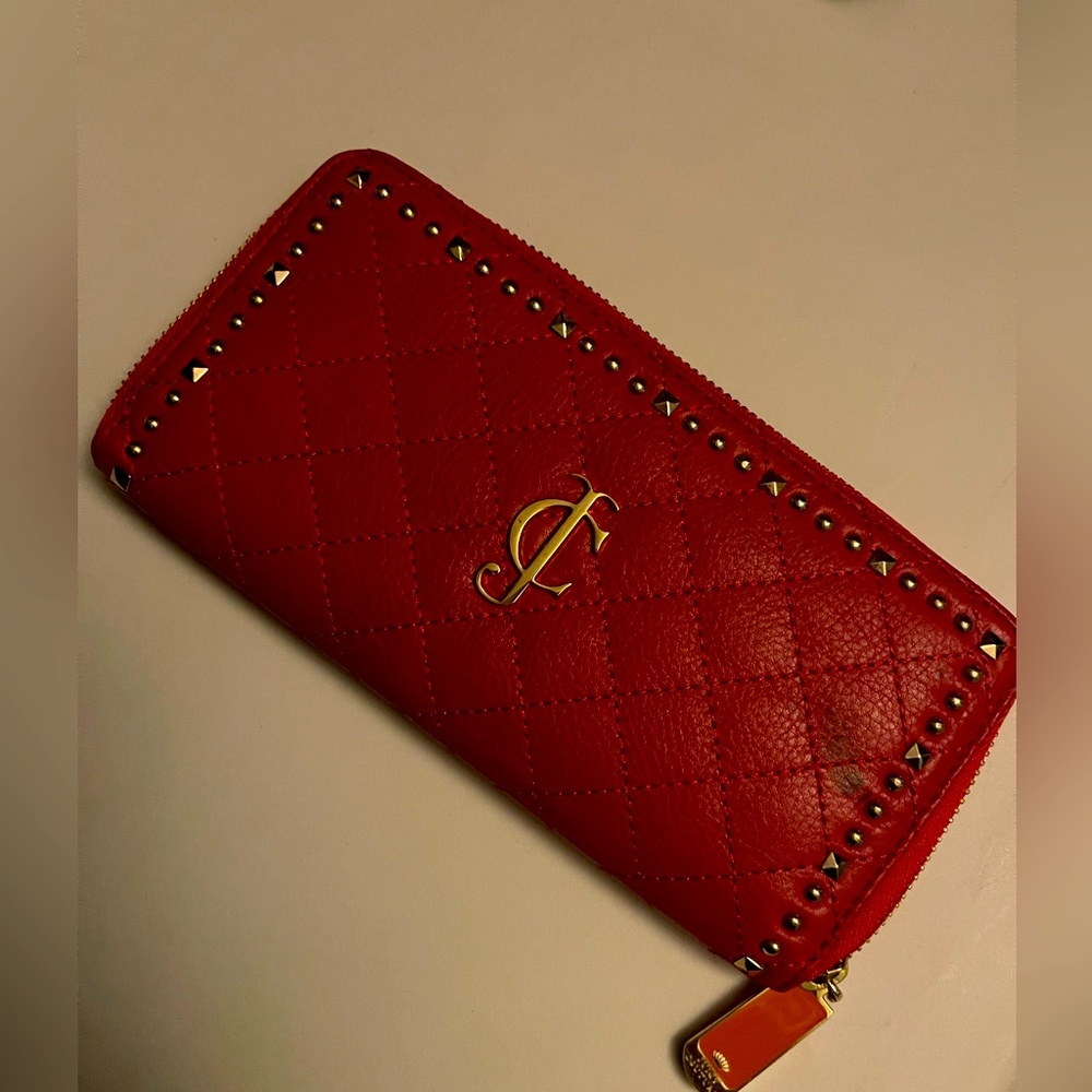 Juicy Couture brand new wallet with small stain on the front.